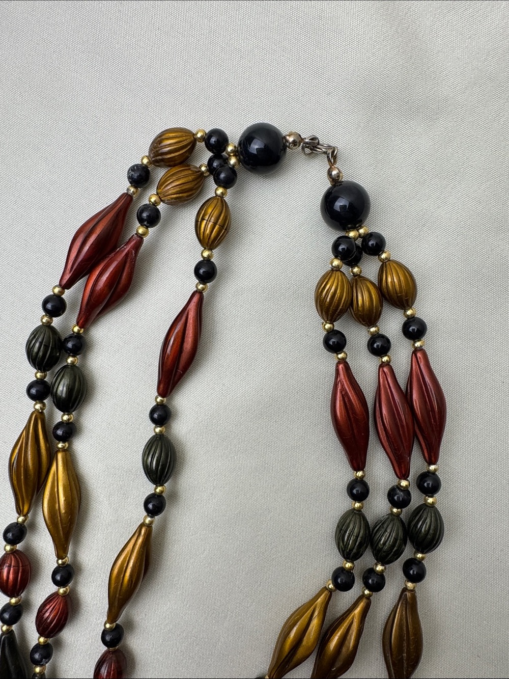 Multi-Strand Metallic Bead Necklace in Red, Gold & Black - Picture 2 of 10
